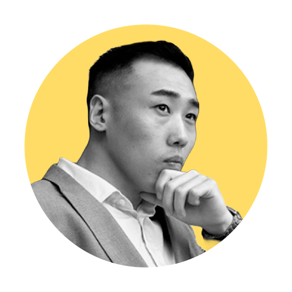 Headshot of Sabastian, black and white photo, yellow background, cropped in a circle shape.